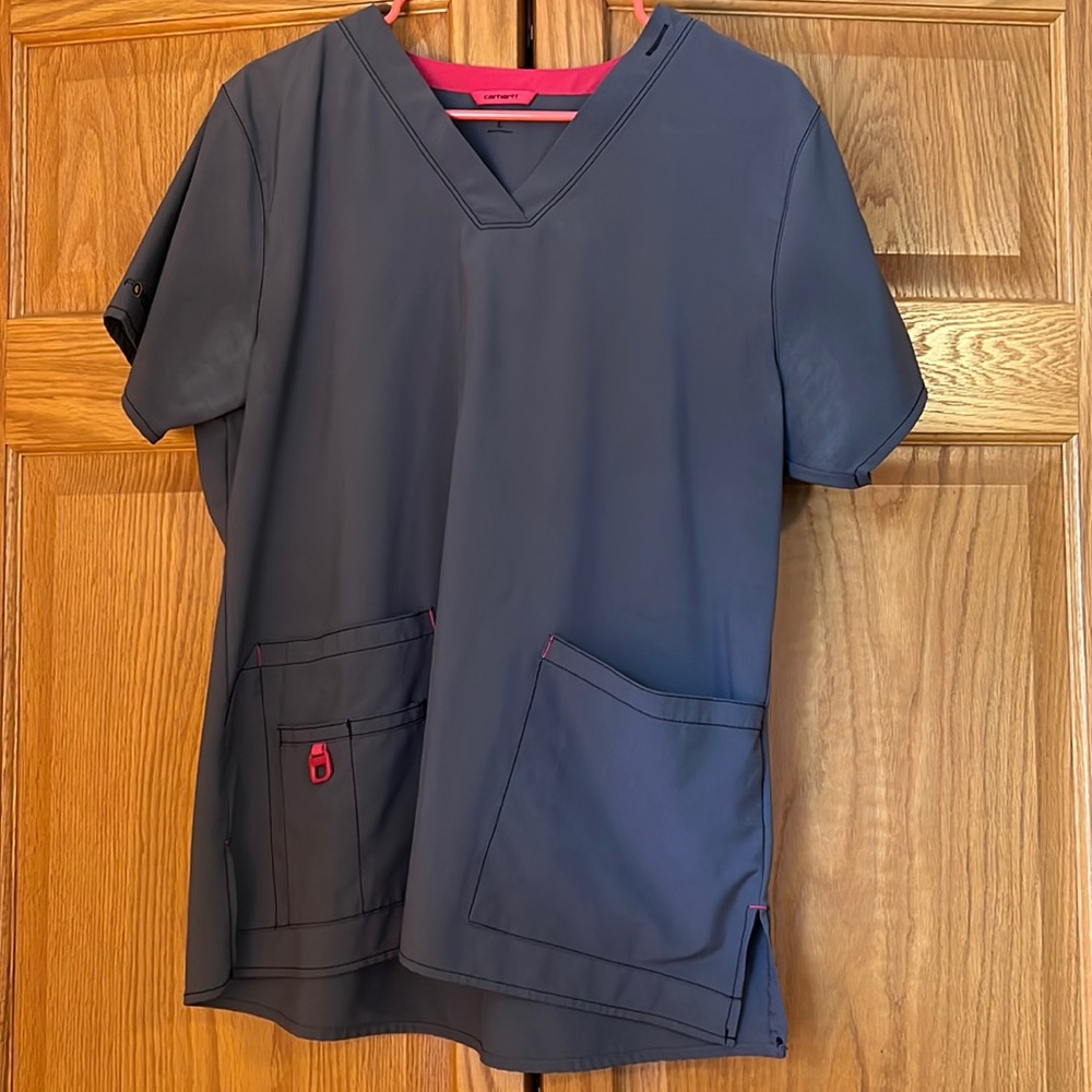 Pink and grey Carhartt scrub top.